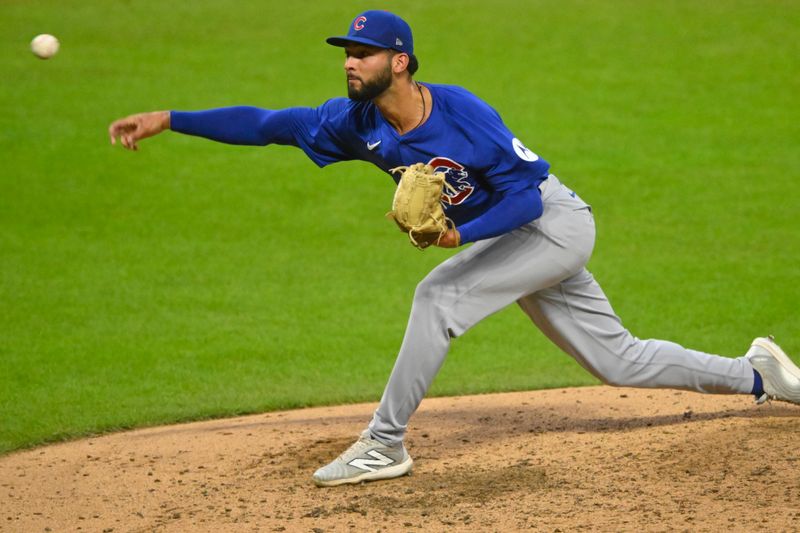 Aug 14, 2024; Cleveland, Ohio, USA; Chicago Cubs relief pitcher Tyson Miller (49) delivers a pitch in the seventh inning against the Cleveland Guardians at Progressive Field. Mandatory Credit: David Richard-USA TODAY Sports