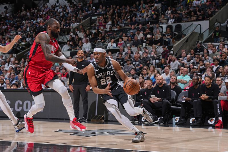 SAN ANTONIO, TX - MARCH 12: Malaki Branham #22 of the San Antonio Spurs dribbles the ball during the game against the Houston Rockets on March 12, 2024 at the Frost Bank Center in San Antonio, Texas. NOTE TO USER: User expressly acknowledges and agrees that, by downloading and or using this photograph, user is consenting to the terms and conditions of the Getty Images License Agreement. Mandatory Copyright Notice: Copyright 2024 NBAE (Photos by Jesse D. Garrabrant/NBAE via Getty Images)