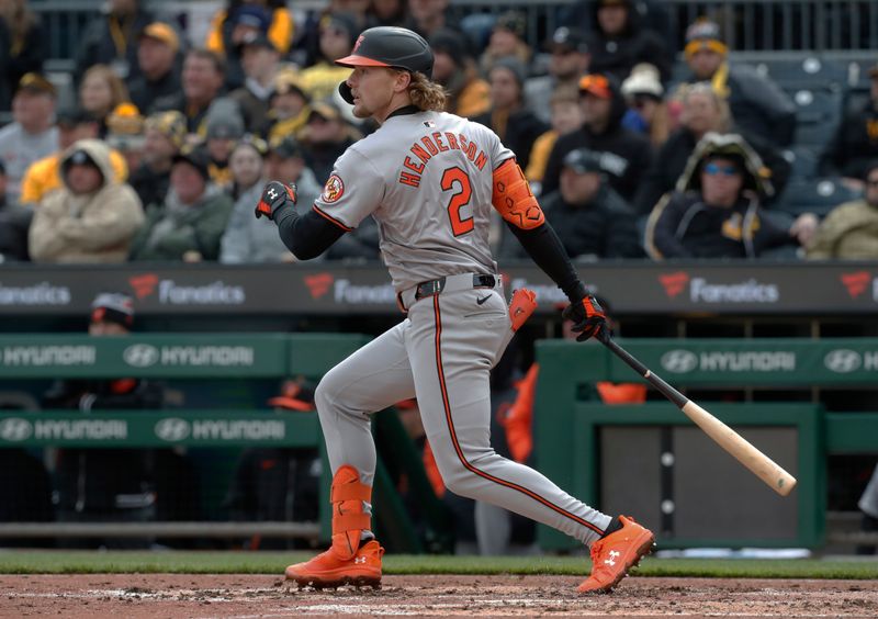 Apr 5, 2024; Pittsburgh, Pennsylvania, USA;  Baltimore Orioles shortstop Gunnar Henderson (2) hits a single against the Pittsburgh Pirates during the seventh inning at PNC Park. Mandatory Credit: Charles LeClaire-USA TODAY Sports