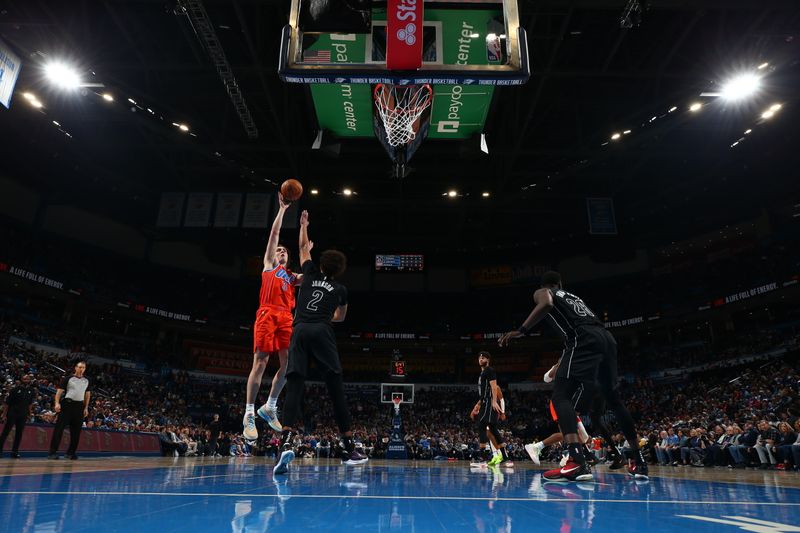 OKLAHOMA CITY, OK - MARCH 14: Josh Giddey #3 of the Oklahoma City Thunder drives to the basket during the game against the Brooklyn Nets on March 14, 2023 at Paycom Arena in Oklahoma City, Oklahoma. NOTE TO USER: User expressly acknowledges and agrees that, by downloading and or using this photograph, User is consenting to the terms and conditions of the Getty Images License Agreement. Mandatory Copyright Notice: Copyright 2023 NBAE (Photo by Zach Beeker/NBAE via Getty Images)