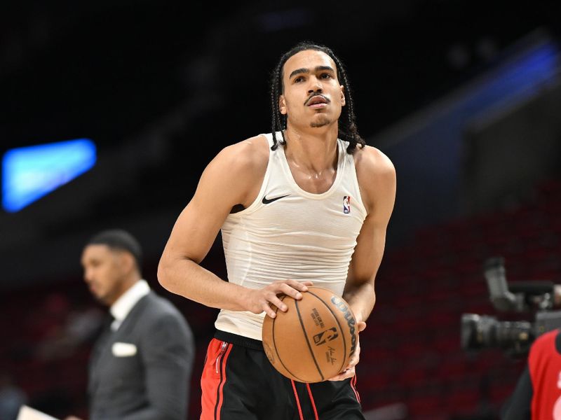 PORTLAND, OREGON - MARCH 08: Dalano Banton #5 of the Portland Trail Blazers warms up before the game against the Houston Rockets at the Moda Center on March 08, 2024 in Portland, Oregon. NOTE TO USER: User expressly acknowledges and agrees that, by downloading and or using this photograph, User is consenting to the terms and conditions of the Getty Images License Agreement. (Photo by Alika Jenner/Getty Images)