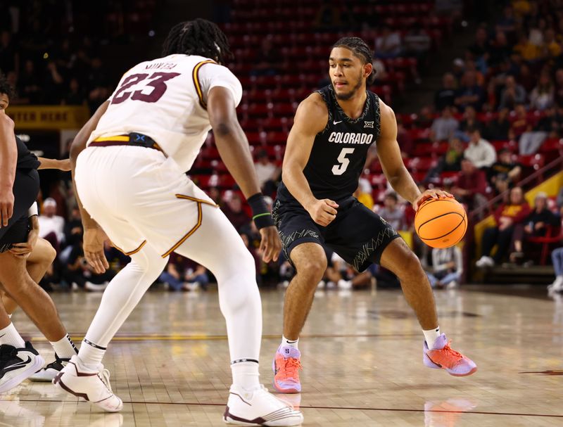 Jan 3, 2026; Tempe, Arizona, USA; Colorado Buffaloes guard Josiah Sanders (5) against the Arizona State Sun Devils in the first half at Desert Financial Arena. Mandatory Credit: Mark J. Rebilas-Imagn Images