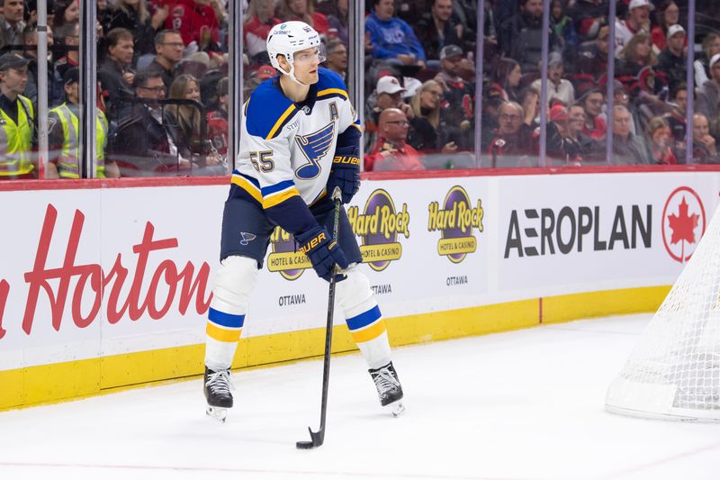 Oct 29, 2024; Ottawa, Ontario, CAN; St. Louis Blues defenseman Colton Parayko (55) controls the puck in the first period against the Ottawa Senators at the Canadian Tire Centre. Mandatory Credit: Marc DesRosiers-Imagn Images