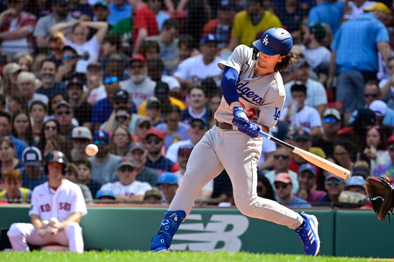 Aug 27, 2023; Boston, Massachusetts, USA; Los Angeles Dodgers center fielder James Outman (33) hits a home run during the fourth inning against the Boston Red Sox at Fenway Park. Mandatory Credit: Eric Canha-USA TODAY Sports