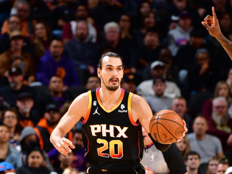 PHOENIX, AZ - NOVEMBER 4: Dario Saric #20 of the Phoenix Suns dribbles the ball during the game against the Portland Trail Blazers on November 4, 2022 at Footprint Center in Phoenix, Arizona. NOTE TO USER: User expressly acknowledges and agrees that, by downloading and or using this photograph, user is consenting to the terms and conditions of the Getty Images License Agreement. Mandatory Copyright Notice: Copyright 2022 NBAE (Photo by Barry Gossage/NBAE via Getty Images)