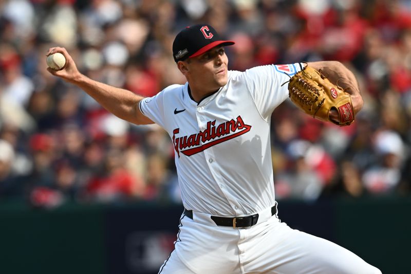 Oct 12, 2024; Cleveland, Ohio, USA; Cleveland Guardians relief pitcher Cade Smith (36) pitches in the third inning against the Detroit Tigers during game five of the ALDS for the 2024 MLB Playoffs at Progressive Field. Mandatory Credit: Ken Blaze-Imagn Images