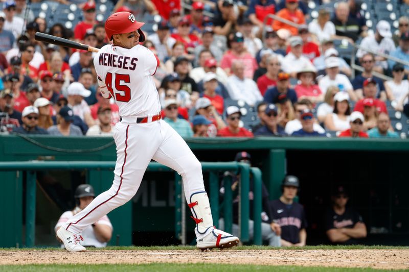 Apr 16, 2023; Washington, District of Columbia, USA; Washington Nationals first baseman Joey Meneses (45) hits a go-ahead RBI single against the Cleveland Guardians during the eighth inning at Nationals Park. Mandatory Credit: Geoff Burke-USA TODAY Sports