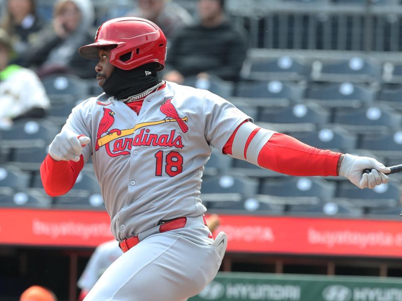 Apr 9, 2025; Pittsburgh, Pennsylvania, USA;  St. Louis Cardinals pinch hitter Jordan Walker hits an RBI single against the Pittsburgh Pirates during the twelfth inning at PNC Park. Mandatory Credit: Charles LeClaire-Imagn Images