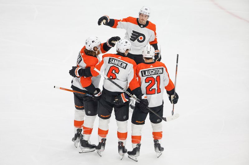 Feb 21, 2024; Chicago, Illinois, USA; Philadelphia Flyers defenseman Travis Sanheim (6) celebrates with teammates after scoring against the Chicago Blackhawks during the first period at United Center. Mandatory Credit: Kamil Krzaczynski-USA TODAY Sports