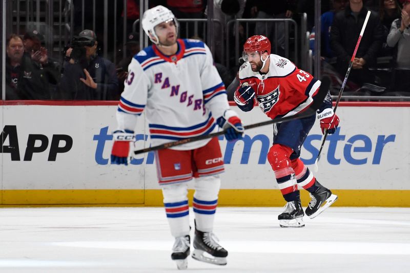 Dec 31, 2025; Washington, District of Columbia, USA; Washington Capitals right wing Tom Wilson (43) celebrates after scoring a goal as New York Rangers left wing Conor Sheary (43) reacts during the second period at Capital One Arena. Mandatory Credit: Hannah Foslien-Imagn Images