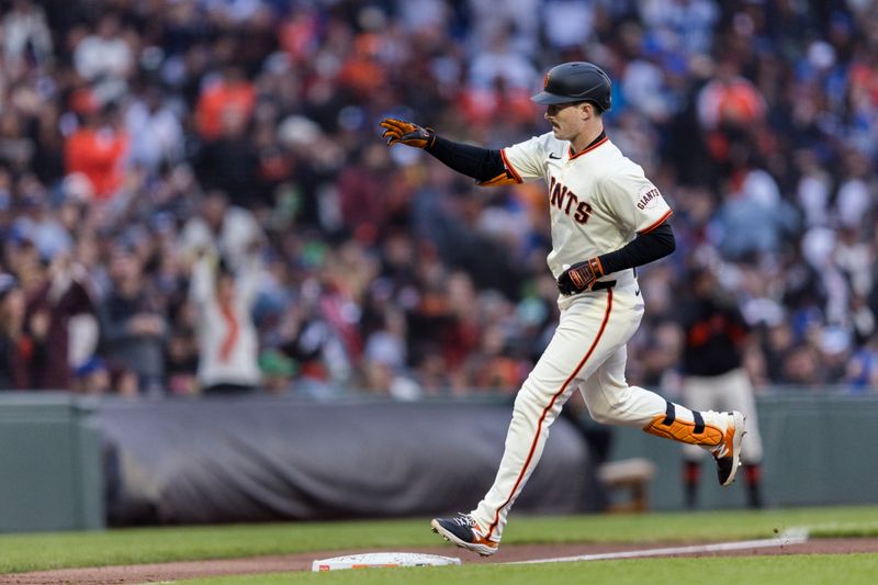 May 15, 2024; San Francisco, California, USA; San Francisco Giants right fielder Mike Yastrzemski (5) runs the bases after hitting a two-run home run against the Los Angeles Dodgers during the third inning at Oracle Park. Mandatory Credit: John Hefti-USA TODAY Sports