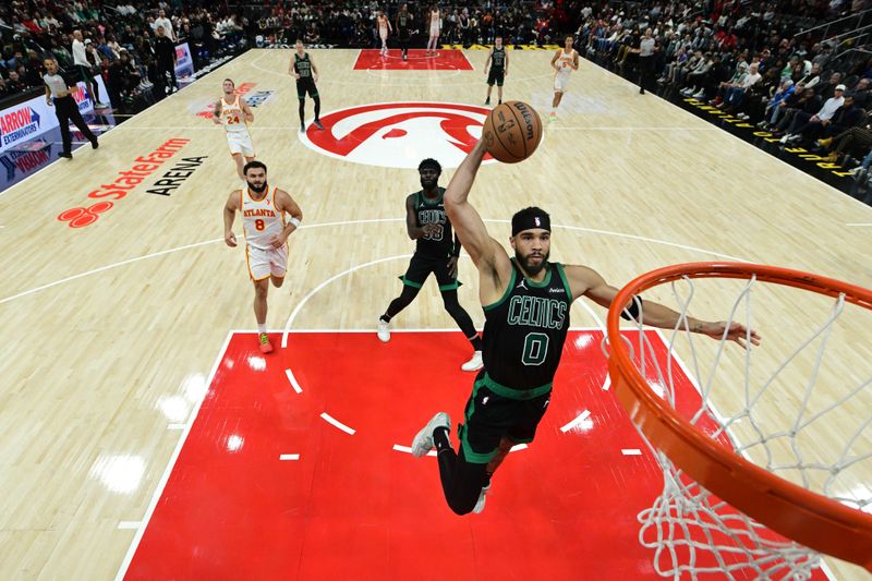 ATLANTA, GA - NOVEMBER 4: Jayson Tatum #0 of the Boston Celtics dunks the ball during the game against the Atlanta Hawks on November 4, 2024 at State Farm Arena in Atlanta, Georgia.  NOTE TO USER: User expressly acknowledges and agrees that, by downloading and/or using this Photograph, user is consenting to the terms and conditions of the Getty Images License Agreement. Mandatory Copyright Notice: Copyright 2024 NBAE (Photo by Adam Hagy/NBAE via Getty Images)