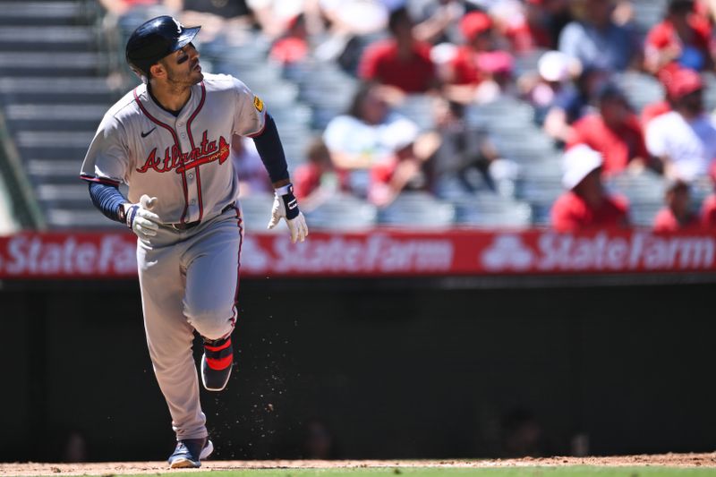 Aug 18, 2024; Anaheim, California, USA; Atlanta Braves outfielder Ramón Laureano (18) hits a home run against the Los Angeles Angels during the fourth inning at Angel Stadium. Mandatory Credit: Jonathan Hui-USA TODAY Sports