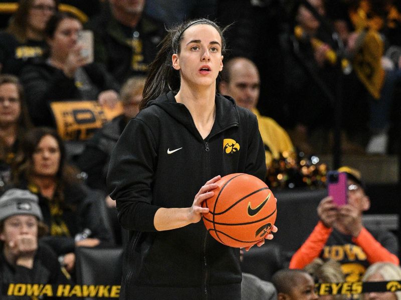 Feb 8, 2024; Iowa City, Iowa, USA; Iowa Hawkeyes guard Caitlin Clark (22) warms up before the game against the Penn State Nittany Lions at Carver-Hawkeye Arena. Mandatory Credit: Jeffrey Becker-USA TODAY Sports