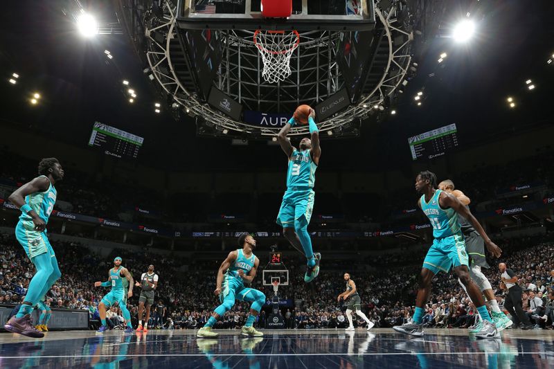 MINNEAPOLIS, MN -  JANUARY 22:  Terry Rozier #3 of the Charlotte Hornets shoots the ball during the game against the Minnesota Timberwolves on January 22, 2024 at Target Center in Minneapolis, Minnesota. NOTE TO USER: User expressly acknowledges and agrees that, by downloading and or using this Photograph, user is consenting to the terms and conditions of the Getty Images License Agreement. Mandatory Copyright Notice: Copyright 2024 NBAE (Photo by David Sherman/NBAE via Getty Images)