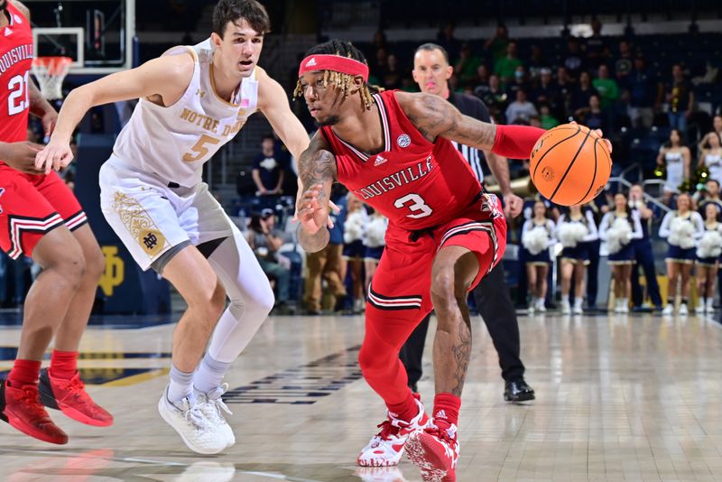 Jan 28, 2023; South Bend, Indiana, USA; Louisville Cardinals guard El Ellis (3) dribbles the ball against Notre Dame Fighting Irish guard Cormac Ryan (5) in the first half at the Purcell Pavilion. Mandatory Credit: Matt Cashore-USA TODAY Sports