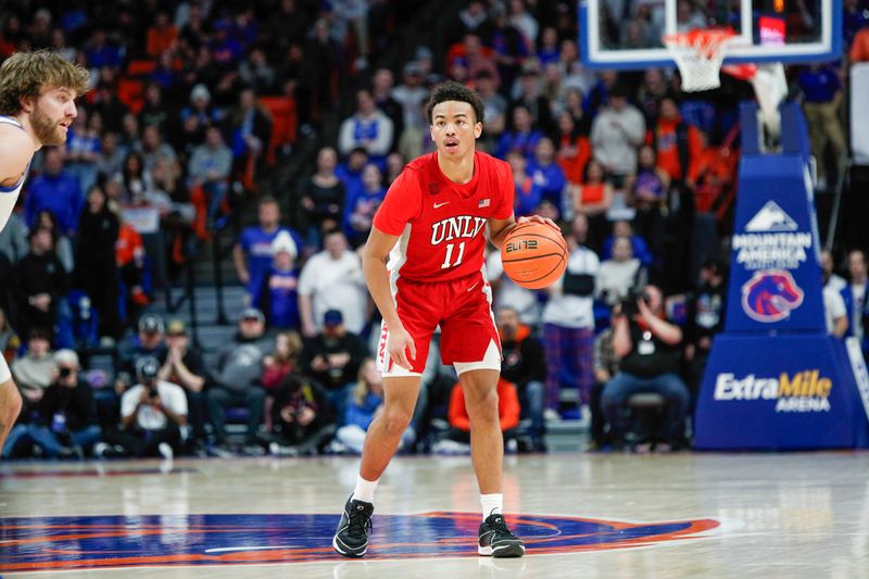 Jan 16, 2024; Boise, Idaho, USA; UNLV Rebels guard Dedan Thomas Jr. (11) during the first half against the Boise State Broncos at ExtraMile Arena. Mandatory Credit: Brian Losness-USA TODAY Sports

