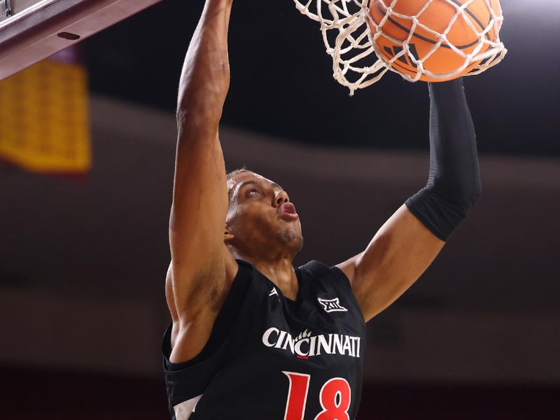 Jan 24, 2026; Tempe, Arizona, USA; Cincinnati Bearcats forward Baba Miller (18) dunks the ball against the Arizona State Sun Devils in the first half at Desert Financial Arena. Mandatory Credit: Mark J. Rebilas-Imagn Images