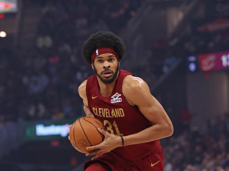 CLEVELAND, OH - FEBRUARY 23: Jarrett Allen #31 of the Cleveland Cavaliers handles the ball during the game against the Memphis Grizzlies on February 23, 2025 at Rocket Arena in Cleveland, Ohio. NOTE TO USER: User expressly acknowledges and agrees that, by downloading and/or using this Photograph, user is consenting to the terms and conditions of the Getty Images License Agreement. Mandatory Copyright Notice: Copyright 2025 NBAE (Photo by Joe Murphy/NBAE via Getty Images)