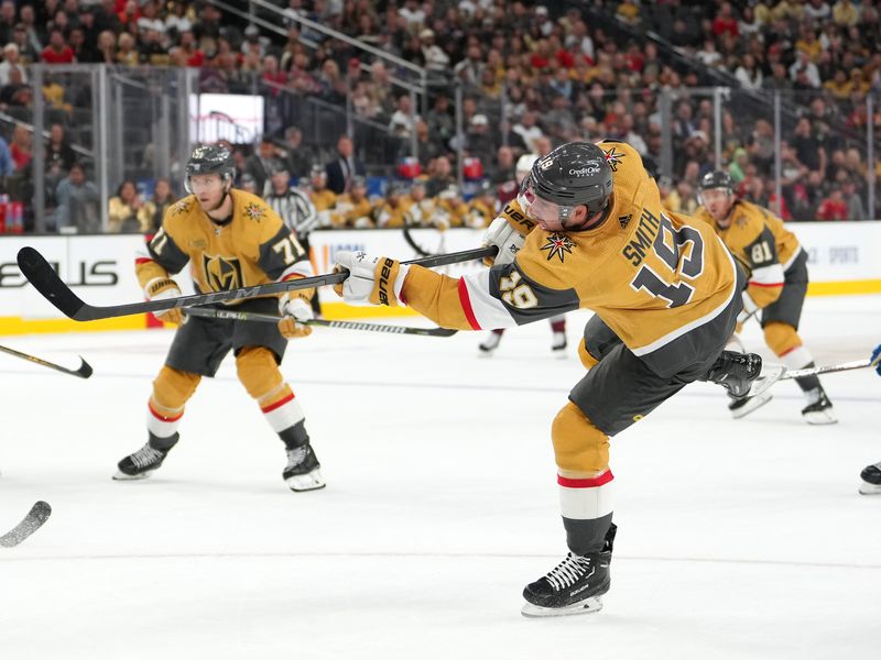 Oct 22, 2022; Las Vegas, Nevada, USA; Vegas Golden Knights right wing Reilly Smith (19) shoots the puck against the Colorado Avalanche during the third period at T-Mobile Arena. Mandatory Credit: Stephen R. Sylvanie-USA TODAY Sports