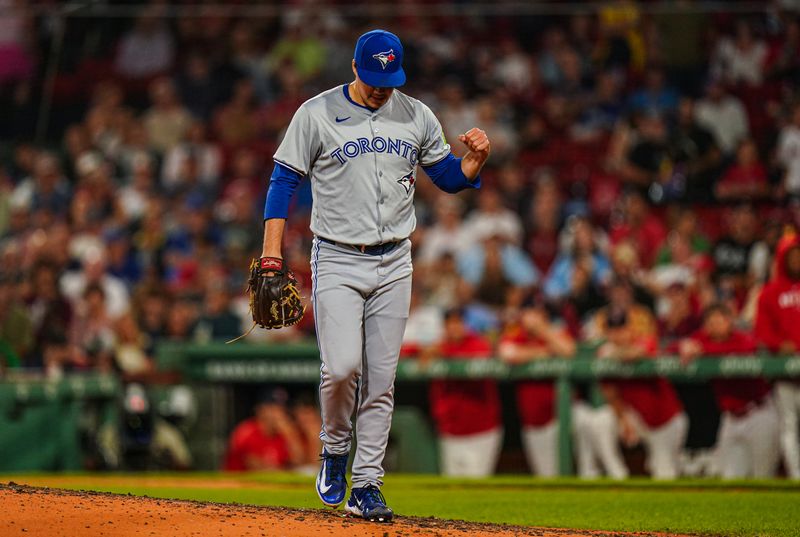 Aug 26, 2024; Boston, Massachusetts, USA; Toronto Blue Jays relief pitcher Brendon Little (54) reacts after ending the game against the Boston Red Sox with a strikeout  in the ninth inning at Fenway Park. Mandatory Credit: David Butler II-USA TODAY Sports