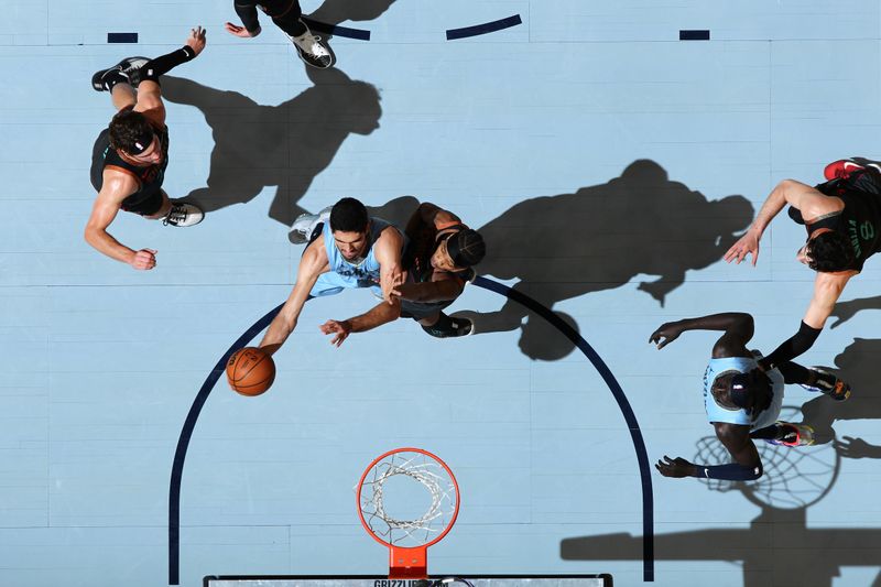 MEMPHIS, TN - MARCH 12: Santi Aldama #7 of the Memphis Grizzlies shoots the ball during the game against the Washington Wizards on March 12, 2024 at FedExForum in Memphis, Tennessee. NOTE TO USER: User expressly acknowledges and agrees that, by downloading and or using this photograph, User is consenting to the terms and conditions of the Getty Images License Agreement. Mandatory Copyright Notice: Copyright 2024 NBAE (Photo by Joe Murphy/NBAE via Getty Images)