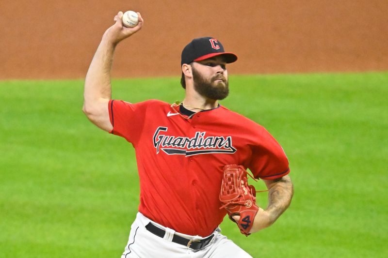 Sep 21, 2023; Cleveland, Ohio, USA; Cleveland Guardians starting pitcher Hunter Gaddis delivers a pitch in the second inning against the Baltimore Orioles at Progressive Field. Mandatory Credit: David Richard-USA TODAY Sports