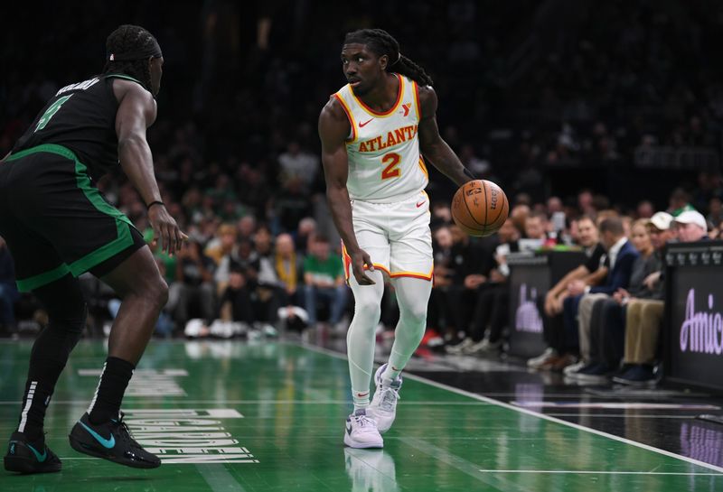 BOSTON, MASSACHUSETTS - NOVEMBER 12: Keaton Wallace #2 of the Atlanta Hawks dribbles the ball against the Boston Celtics during the first half of an Emirates NBA Cup game at TD Garden on November 12, 2024 in Boston, Massachusetts. NOTE TO USER: User expressly acknowledges and agrees that, by downloading and or using this photograph, User is consenting to the terms and conditions of the Getty Images License Agreement. (Photo by China Wong/Getty Images)