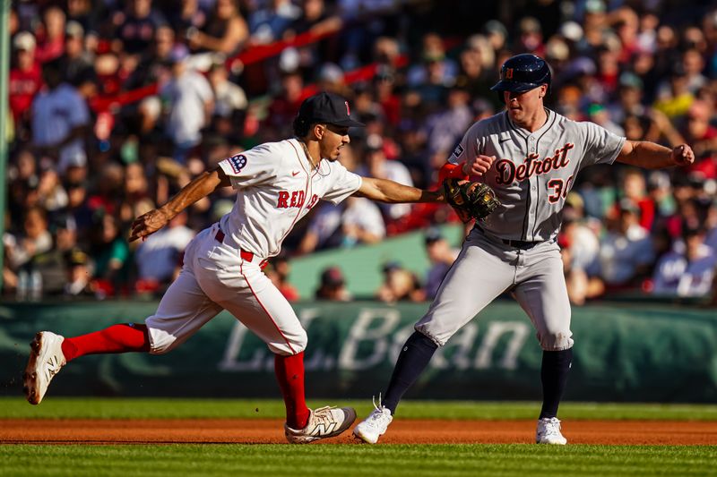 Sep 28, 2025; Boston, Massachusetts, USA; Detroit Tigers outfielder Kerry Carpenter (30) tagged out by Boston Red Sox second base David Hamilton (17) in the fourth inning at Fenway Park. Mandatory Credit: David Butler II-Imagn Images