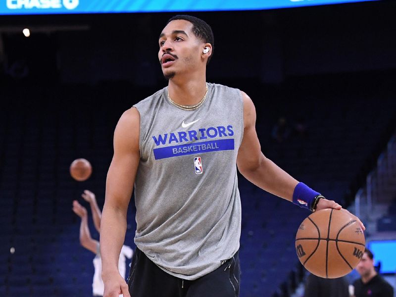 SAN FRANCISCO, CA - MARCH 24: Jordan Poole #3 of the Golden State Warriors warms up before the game against the Philadelphia 76ers on March 24, 2023 at Chase Center in San Francisco, California. NOTE TO USER: User expressly acknowledges and agrees that, by downloading and or using this photograph, user is consenting to the terms and conditions of Getty Images License Agreement. Mandatory Copyright Notice: Copyright 2023 NBAE (Photo by Noah Graham/NBAE via Getty Images)