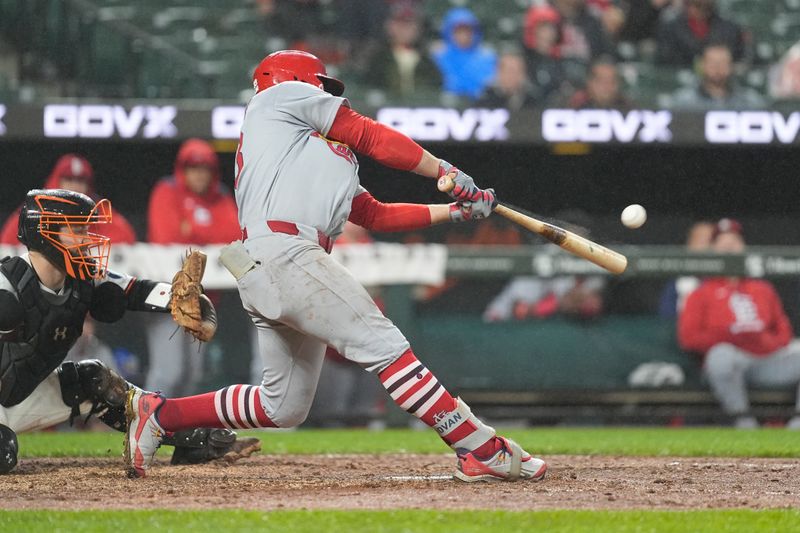 May 28, 2025; Baltimore, Maryland, USA; St. Louis Cardinals second baseman Brendan Donovan (33) hits a two run home run against the Baltimore Orioles during the fifth inning at Oriole Park at Camden Yards. Mandatory Credit: Gregory Fisher-Imagn Images