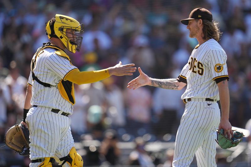 Aug 23, 2023; San Diego, California, USA;  San Diego Padres relief pitcher Josh Hader (right) is congratulated by catcher Gary Sanchez (left) after the game against the Miami Marlins at Petco Park. Mandatory Credit: Ray Acevedo-USA TODAY Sports