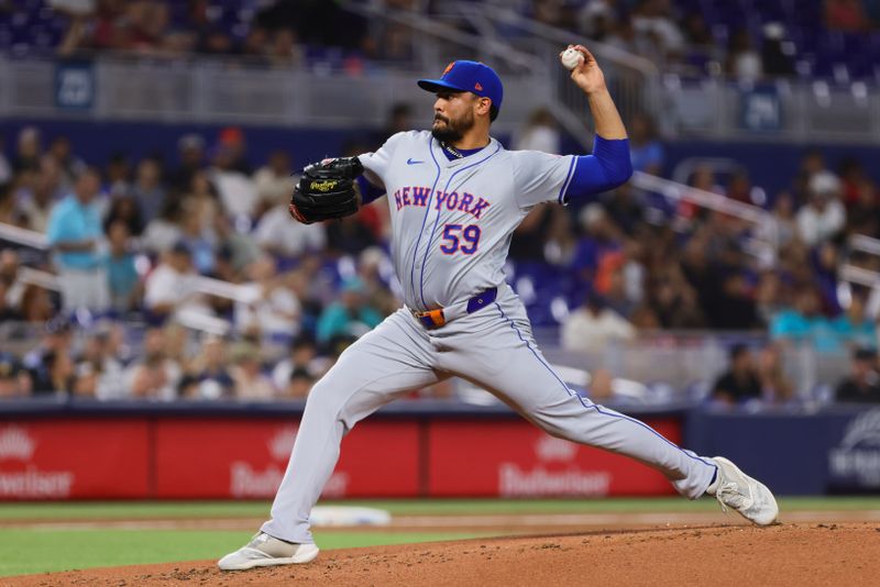 Jul 19, 2024; Miami, Florida, USA; New York Mets starting pitcher Sean Manaea (59) delivers a pitch against the Miami Marlins during the first inning at loanDepot Park. Mandatory Credit: Sam Navarro-USA TODAY Sports