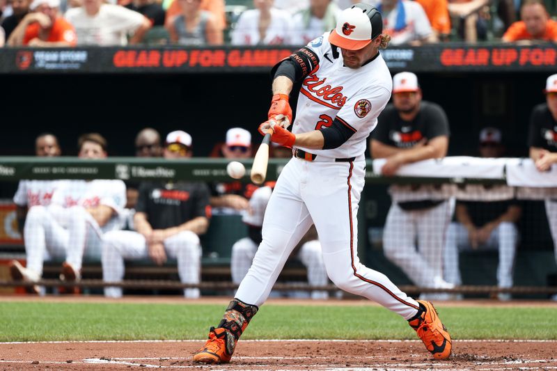 Jun 29, 2025; Baltimore, Maryland, USA; Baltimore Orioles shortstop Gunnar Henderson (2) hits a single during the first inning against the Tampa Bay Rays at Oriole Park at Camden Yards. Mandatory Credit: Daniel Kucin Jr.-Imagn Images