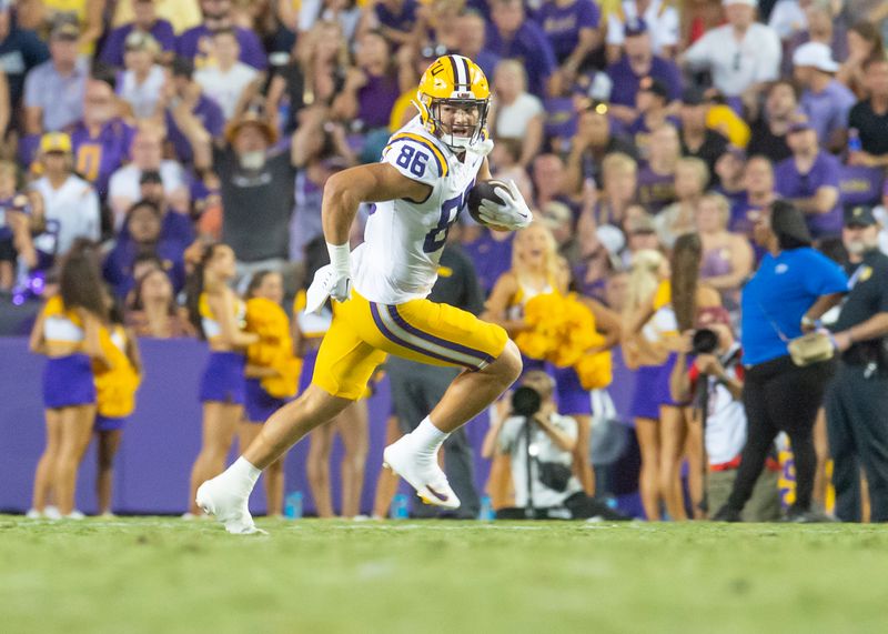 Sep 23, 2023; Baton Rouge, Louisiana, USA; LSU Tigers tight end Mason Taylor (86) runs the ball during the game against Arkansas Razorbacks at Tiger Stadium. Mandatory Credit: Scott Clause-USA TODAY Sports