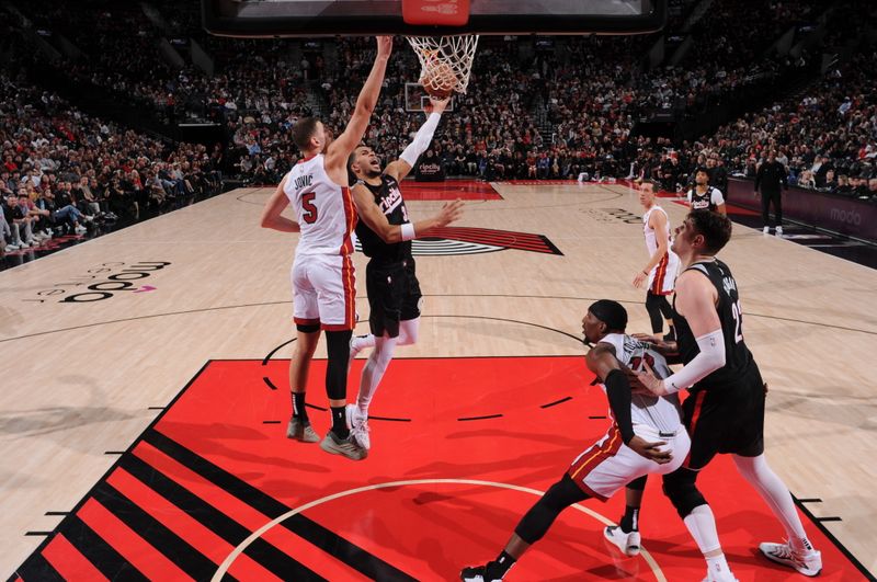 PORTLAND, OR - JANUARY 11: Toumani Camara #33 of the Portland Trail Blazers shoots the ball during the game against the Miami Heat on January 11, 2025 at the Moda Center Arena in Portland, Oregon. NOTE TO USER: User expressly acknowledges and agrees that, by downloading and or using this photograph, user is consenting to the terms and conditions of the Getty Images License Agreement. Mandatory Copyright Notice: Copyright 2025 NBAE (Photo by Cameron Browne/NBAE via Getty Images)