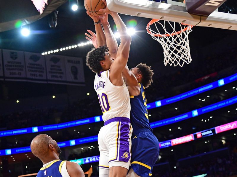 LOS ANGELES, CA - MACH 16: Max Christie #10 of the Los Angeles Lakers drives to the basket during the game against the Golden State Warriors on March 16, 2024 at Crypto.Com Arena in Los Angeles, California. NOTE TO USER: User expressly acknowledges and agrees that, by downloading and/or using this Photograph, user is consenting to the terms and conditions of the Getty Images License Agreement. Mandatory Copyright Notice: Copyright 2024 NBAE (Photo by Adam Pantozzi/NBAE via Getty Images)