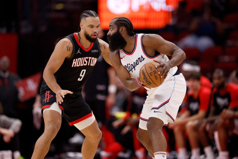 HOUSTON, TEXAS - NOVEMBER 13: Dillon Brooks #9 of the Houston Rockets defends James Harden #1 of the Los Angeles Clippers in the first half at Toyota Center on November 13, 2024 in Houston, Texas.  NOTE TO USER: User expressly acknowledges and agrees that, by downloading and or using this photograph, User is consenting to the terms and conditions of the Getty Images License Agreement.  (Photo by Tim Warner/Getty Images)