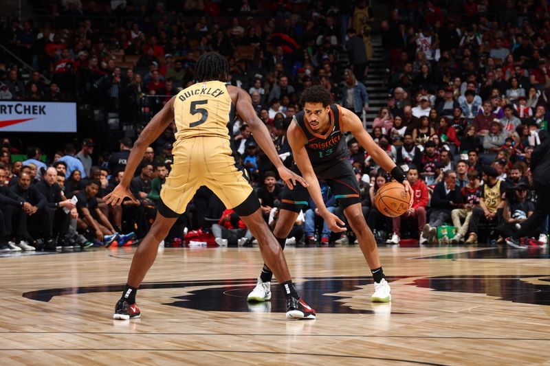 TORONTO, CANADA - APRIL 7: Jordan Poole #13 of the Washington Wizards dribbles the ball during the game against the Toronto Raptors on April 7, 2024 at the Scotiabank Arena in Toronto, Ontario, Canada.  NOTE TO USER: User expressly acknowledges and agrees that, by downloading and or using this Photograph, user is consenting to the terms and conditions of the Getty Images License Agreement.  Mandatory Copyright Notice: Copyright 2024 NBAE (Photo by Vaughn Ridley/NBAE via Getty Images)