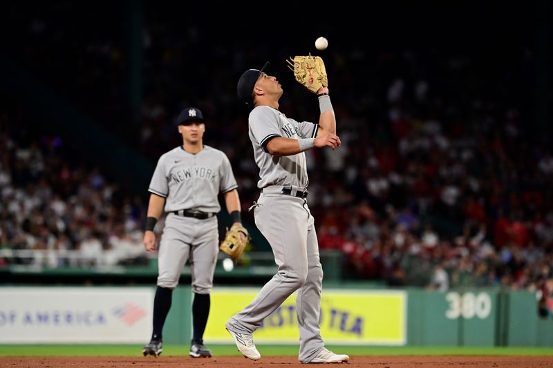 Sep 14, 2023; Boston, Massachusetts, USA; New York Yankees third baseman Oswald Peraza (91) catches a pop fly for an out during the sixth inning against the New York Yankees at Fenway Park. Mandatory Credit: Eric Canha-USA TODAY Sports