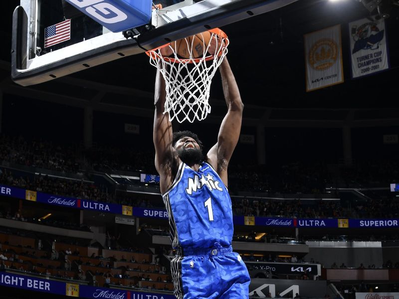 ORLANDO, FL - MARCH 23: Jonathan Isaac #1 of the Orlando Magic dunks the ball during the game against the Sacramento Kings on March 23, 2024 at the Kia Center in Orlando, Florida. NOTE TO USER: User expressly acknowledges and agrees that, by downloading and or using this photograph, User is consenting to the terms and conditions of the Getty Images License Agreement. Mandatory Copyright Notice: Copyright 2024 NBAE (Photo by Fernando Medina/NBAE via Getty Images)