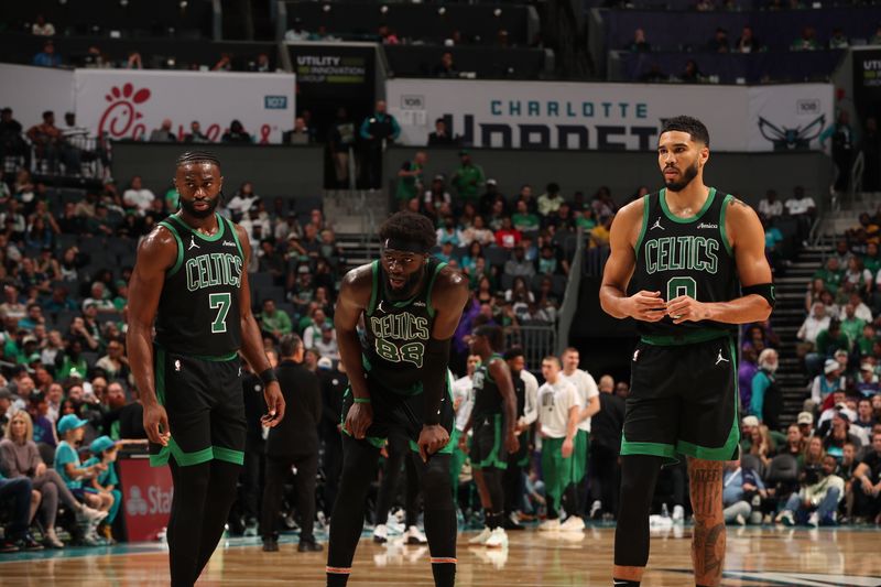 CHARLOTTE, NC - NOVEMBER 1: Jaylen Brown #7, Neemias Queta #88 and Jayson Tatum #0 of the Boston Celtics during the game against the Charlotte Hornets  on November  1, 2024 at Spectrum Center in Charlotte, North Carolina. NOTE TO USER: User expressly acknowledges and agrees that, by downloading and or using this photograph, User is consenting to the terms and conditions of the Getty Images License Agreement. Mandatory Copyright Notice: Copyright 2024 NBAE (Photo by Kent Smith/NBAE via Getty Images)