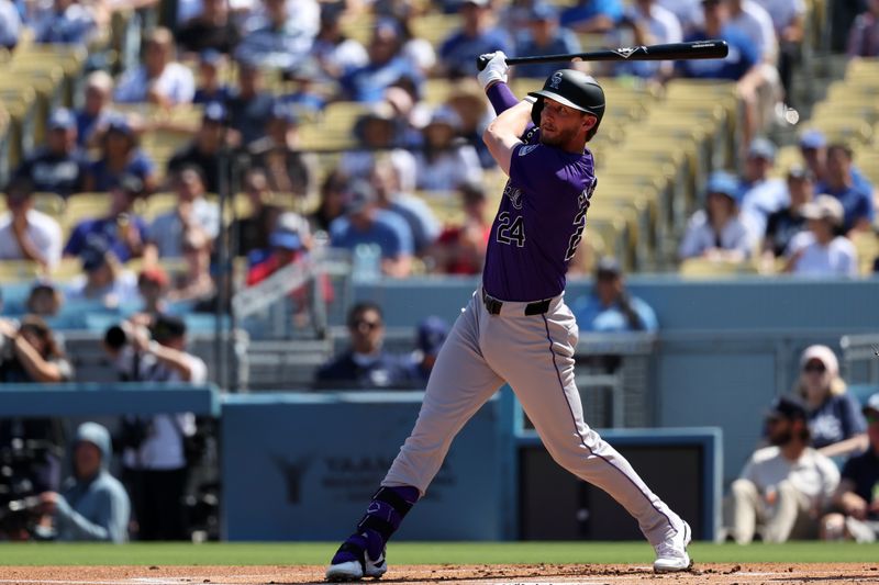 Sep 22, 2024; Los Angeles, California, USA;  Colorado Rockies third baseman Ryan McMahon (24) hits a single during the first inning against the Los Angeles Dodgers at Dodger Stadium. Mandatory Credit: Kiyoshi Mio-Imagn Images