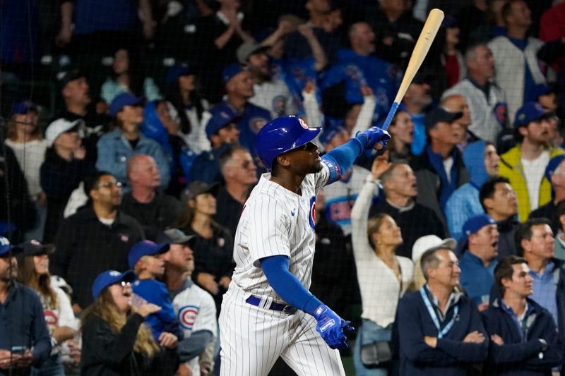 Sep 19, 2023; Chicago, Illinois, USA; Chicago Cubs designated hitter Alexander Canario (4) hits a grand slam home run against the Pittsburgh Pirates during the eighth inning at Wrigley Field. Mandatory Credit: David Banks-USA TODAY Sports