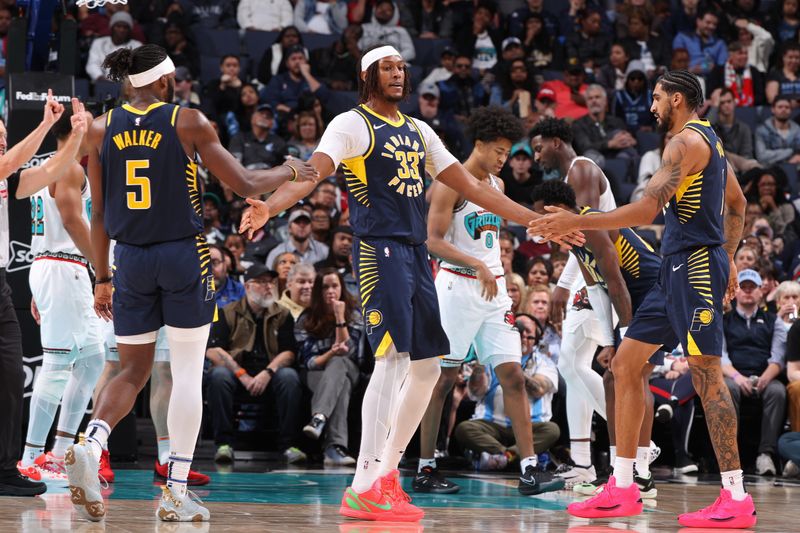 MEMPHIS, TN - DECEMBER 1: Myles Turner #33 of the Indiana Pacers high fives teammates during the game against the Memphis Grizzlies on December 1, 2024 at FedExForum in Memphis, Tennessee. NOTE TO USER: User expressly acknowledges and agrees that, by downloading and or using this photograph, User is consenting to the terms and conditions of the Getty Images License Agreement. Mandatory Copyright Notice: Copyright 2024 NBAE (Photo by Joe Murphy/NBAE via Getty Images)