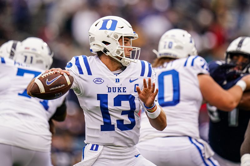 Sep 23, 2023; East Hartford, Connecticut, USA; Duke Blue Devils quarterback Riley Leonard (13) throws a pass against the UConn Huskies at Rentschler Field at Pratt & Whitney Stadium. Mandatory Credit: David Butler II-USA TODAY Sports