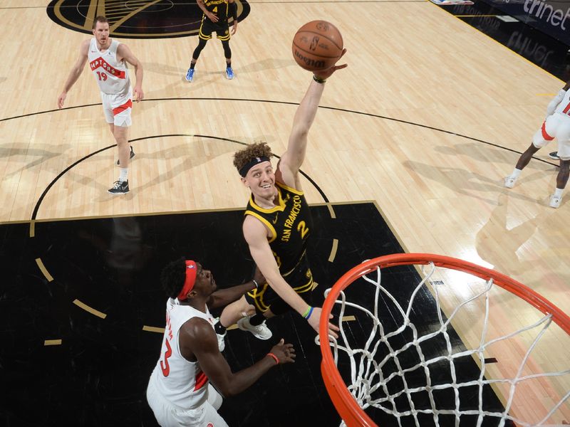 SAN FRANCISCO, CA - JANUARY 7: Brandin Podziemski #2 of the Golden State Warriors drives to the basket during the game against the Toronto Raptors on January 7, 2024 at Chase Center in San Francisco, California. NOTE TO USER: User expressly acknowledges and agrees that, by downloading and or using this photograph, user is consenting to the terms and conditions of Getty Images License Agreement. Mandatory Copyright Notice: Copyright 2024 NBAE (Photo by Noah Graham/NBAE via Getty Images)