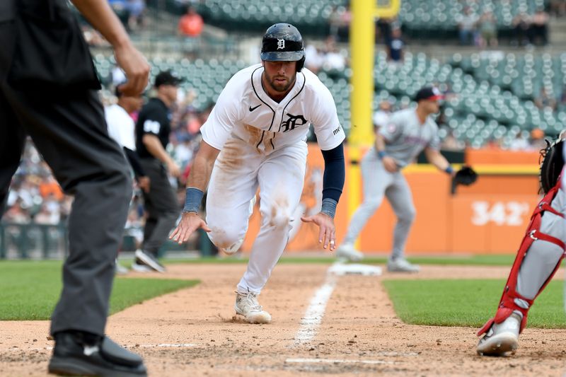 Jun 13, 2024; Detroit, Michigan, USA;  Detroit Tigers center fielder Matt Vierling (8) gets ready to slide into home plate to score a run against the Washington Nationals in the seventh inning at Comerica Park. Mandatory Credit: Lon Horwedel-USA TODAY Sports