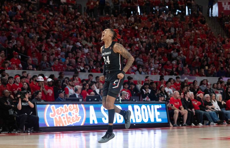 Jan 28, 2023; Houston, Texas, USA;Cincinnati Bearcats guard Jeremiah Davenport (24) celebrates his three point basket against the Houston Cougars in the first half at Fertitta Center. Mandatory Credit: Thomas Shea-USA TODAY Sports