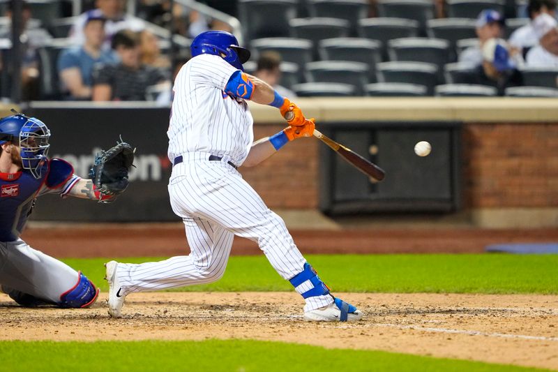 Aug 30, 2023; New York City, New York, USA;  New York Mets right fielder DJ Steward (29) hits a two run home run against the Texas Rangers during the eighth inning at Citi Field. Mandatory Credit: Gregory Fisher-USA TODAY Sports